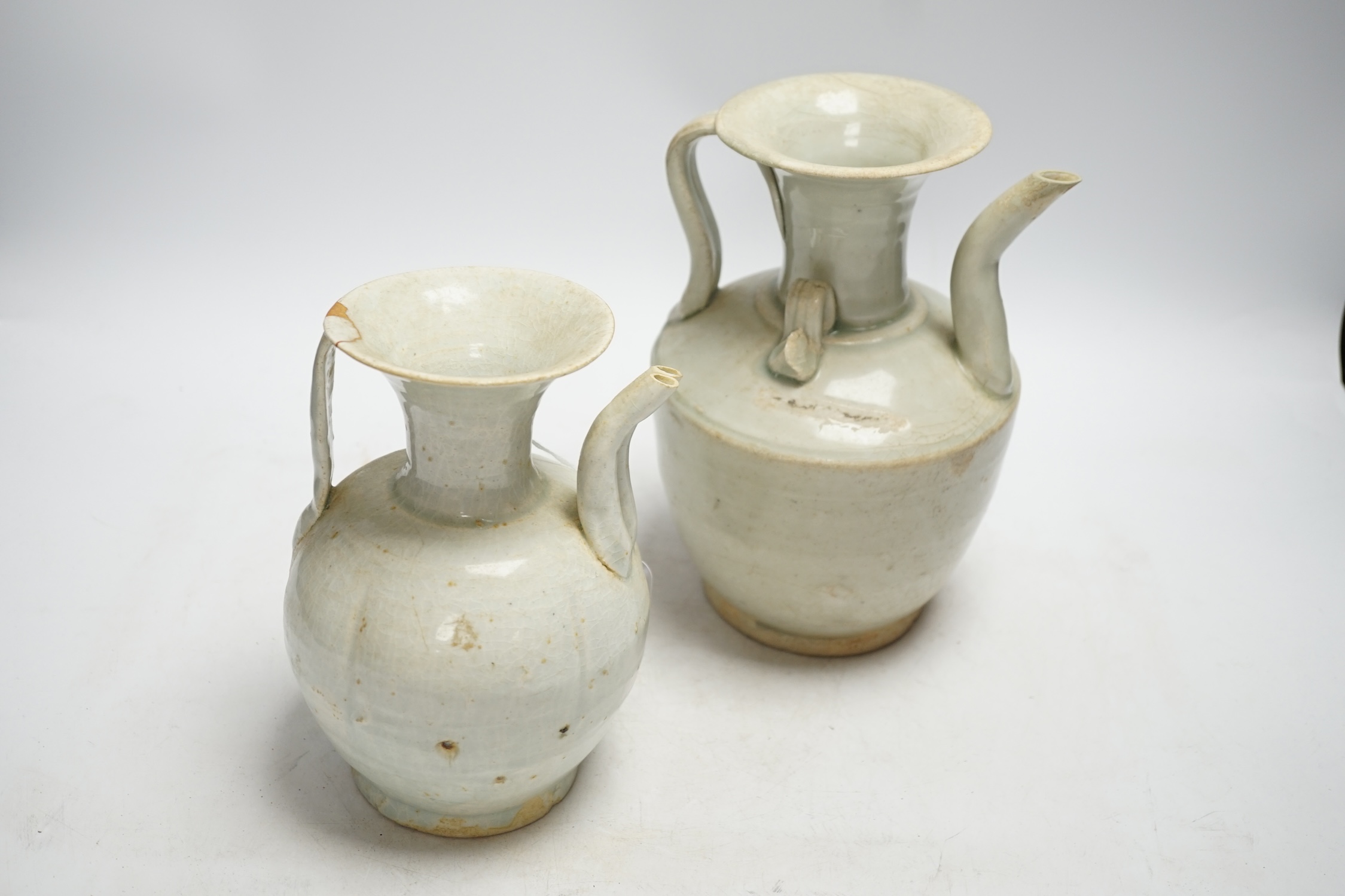 Two Chinese qingbai ewers, Song dynasty, one has Oxford thermoluminescence certificate, tallest 23cm